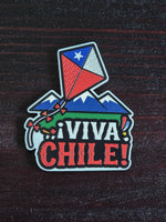 Imán ¡Viva Chile! con un volantín sobre la cordillera